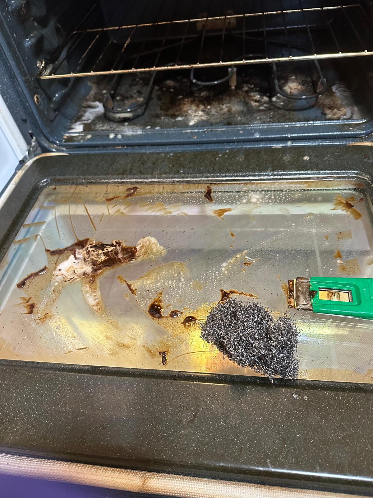 Before: Oven door — baked-on grease — Keep Clean Solutions LLC