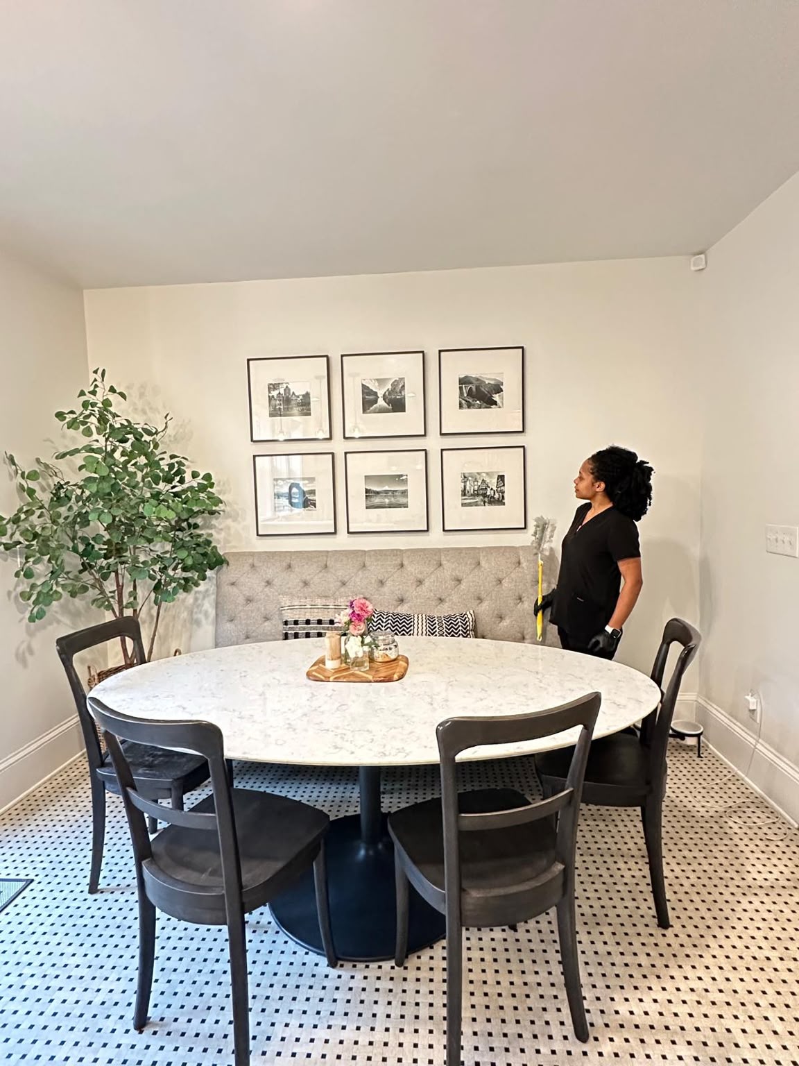 Eline cleaning a dining room in a Portland area home